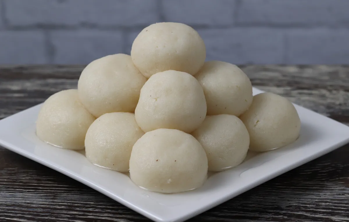 Rasgulla - Soft and spongy Bengali sweet balls in sugar syrup